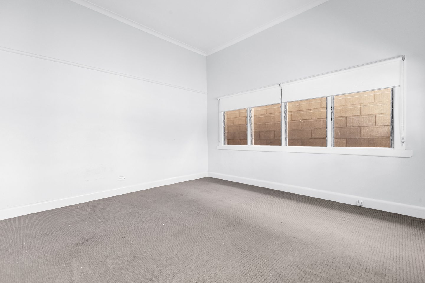 Bedroom with a wide window