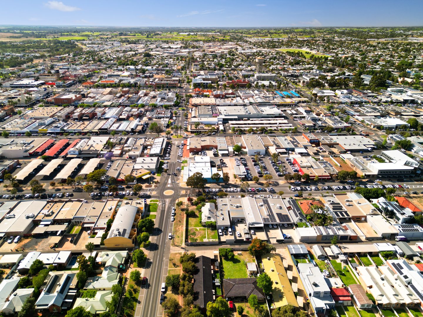 Aerial view of surrounding streets and buildings